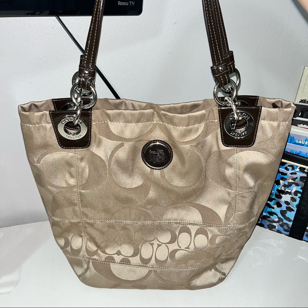 Coach Sateen bucket style tote bag beige color with pink lining